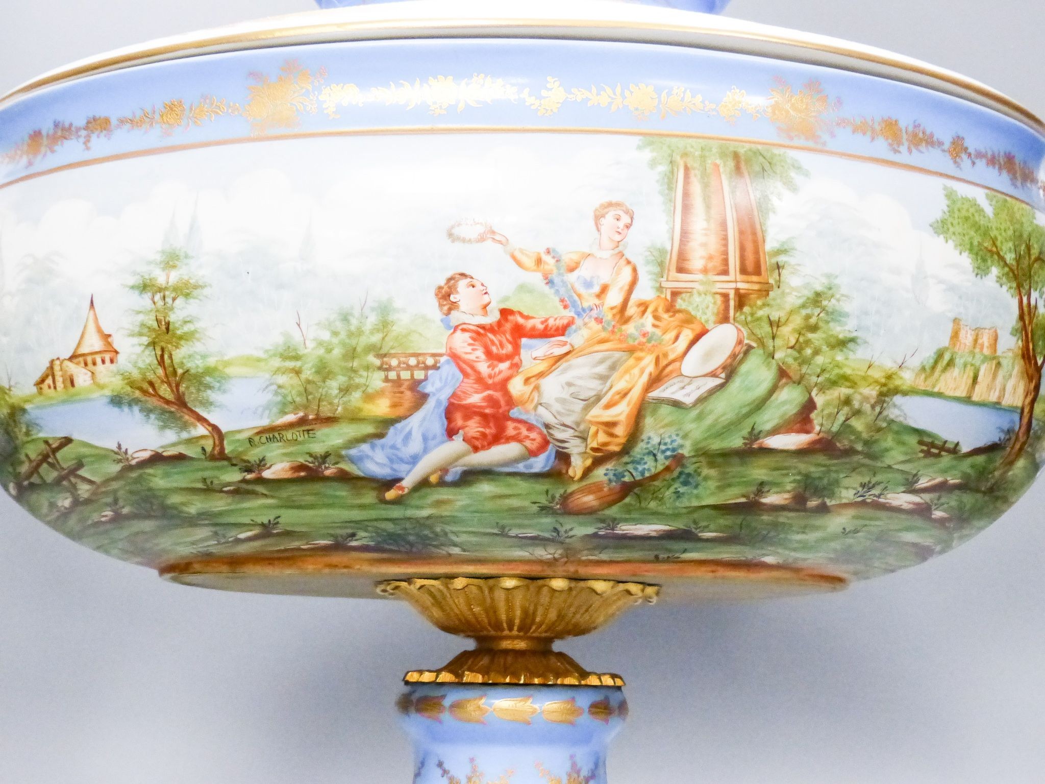 A large 20th century Sevres style porcelain and brass mounted pedestal vase and cover, 49 cm wide